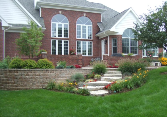 A nice brick home with unique, beautiful landscaping